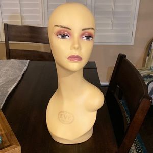 Mannequin head display for wigs or various other accessories.
